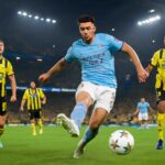 manchester city domine dortmund dans un match intense, tandis que cherki marque un but remarquable et se fait remarquer par sa performance exceptionnelle.