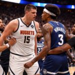 revivez l'altercation explosive entre nikola jokic et jaden mcdaniels qui a conduit à l'expulsion du joueur lors d'un match intense de basket usa.