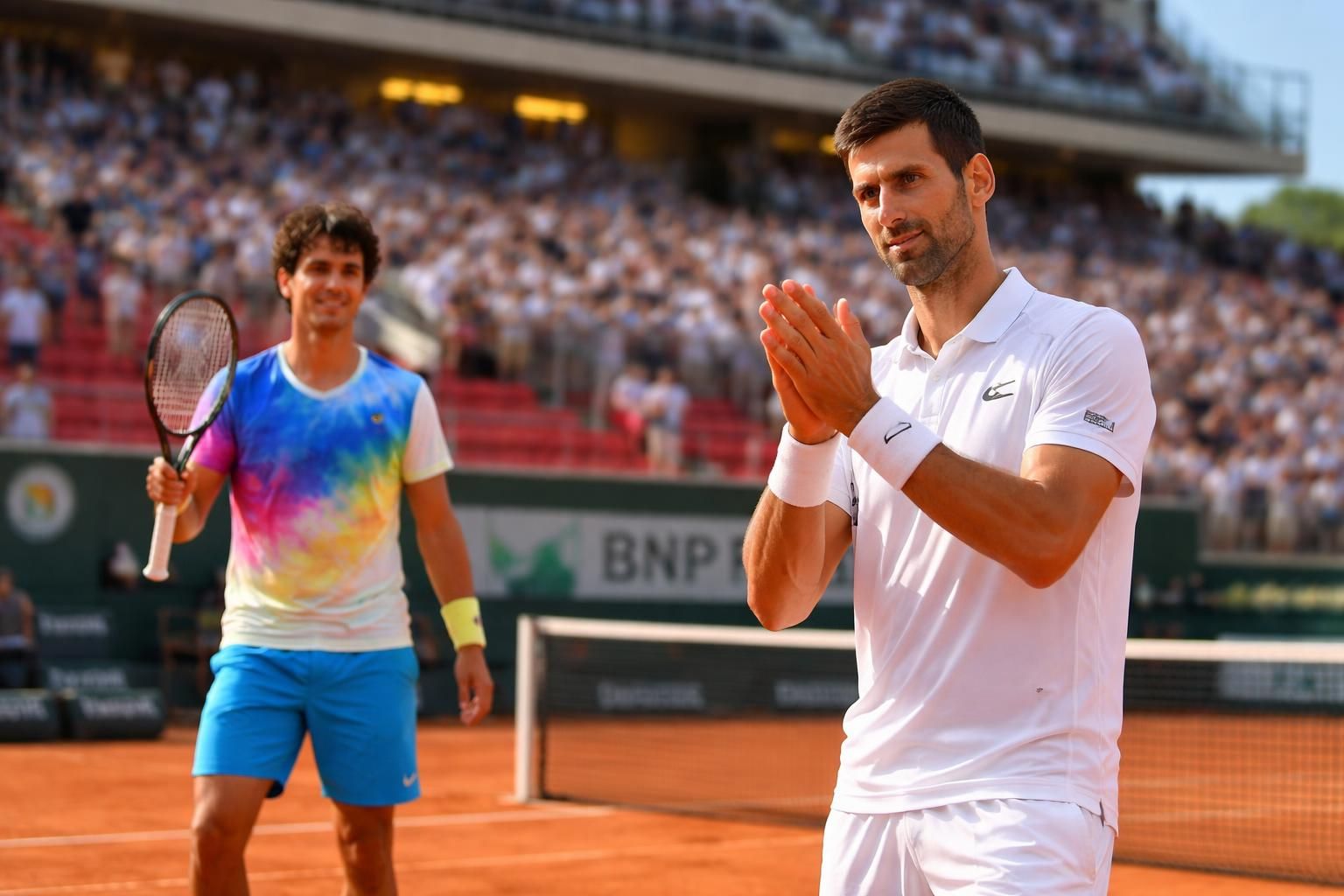 tennis - roland-garros : novak djokovic admet la supériorité de fonseca après leur confrontation, soulignant la performance remarquable de son adversaire.