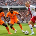 découvrez comment pepe et kessié joueront un rôle clé pour la côte d'ivoire face à la norvège, en tentant de neutraliser la menace portée par haaland lors de ce match intense.