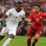 découvrez comment embolo et ndoye seront titulaires pour le match décisif entre le qatar et la suisse lors de la coupe du monde 2026, selon africa top sports.
