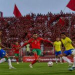 découvrez l'analyse d'el aynaoui qui mise sur un exploit historique des lions de l’atlas face au brésil dans ce match très attendu.
