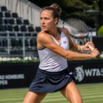 suivez diane parry à l'open de bad homburg où elle peaufine son jeu en allemagne, préparant avec détermination wimbledon, le grand rendez-vous du tennis sur gazon.